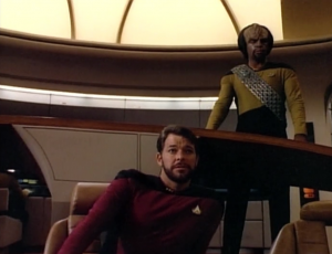 Riker has a beard! Worf in gold! and muscle pads!