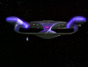 A light orb goes into Enterprise