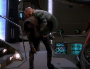 Quark attacks a Klingon