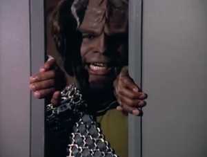 Worf says "One Riker! one bridge!" and then starts fighting a door