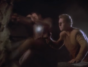 A Bajoran security guy gets shot