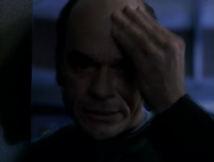 His head starts hurting with pain! Holograms don't feel pain!