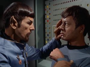 Mirror-Spock doesn't know why people are acting so nice so he mind melds with Bones