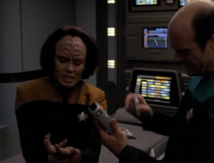 B'Elanna shows up. Says no one appeared on sensors because they were damaged. 