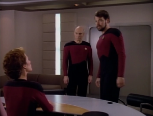 They have to hold a hearing on whether Data is property or a person. Because of some regulation that doesn't make any sense and is a bad attempt by the writers to add tension, Riker has to represent the position against Picard and Data