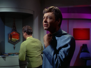 Enterprise is picking up delegates from the various Federation members. Can't Kirk arrange for his mirror to be at his own height?