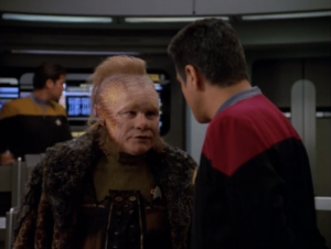 Neelix is being a good delta quadrant guide. He even wears cooler clothes in this one.