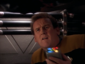 O'Brien makes that face that he makes sometimes and finds the life-form, which is now dead