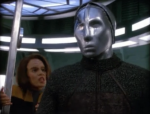 We find out that the robots were programed to fight a war for the builders of two worlds, but when the people reached a peace agreement the robots were going to be terminated. The robots instead killed all the builders. I guess this episode turned into a decent argument for the prime directive, or to at least make sure that if you help robots, they aren't murder robots
