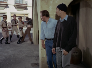 Kirk and Spock beam down to a planet and find some Nazis