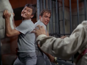 ...But Kirk doesn't use his gun, and instead fights with a sword too. I guess he just wanted to be sporting. Bones is even more sporting, fighting with a mattress