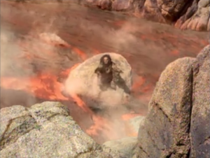 One of the neighbor aliens gets stuck and saves her