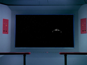 Kirk gets mad and tells them to drive into the neutral zone