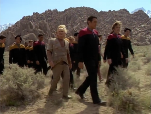 The crew is dropped on a planet and the Kazon take Voyager