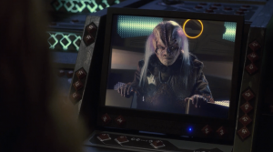There's another bounty hunter that wants to take Archer in. It's the guy who plays Gowron!
