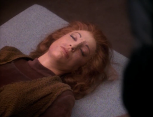 They show Kira the dead body of the person she replaced