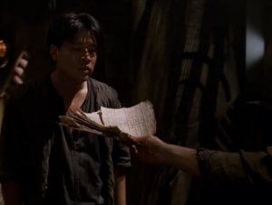 The guy offers to show Kim his manifesto, which he says can teach him to control the clamp. Kim knocks it out of his hands and calls him crazy. That's rude