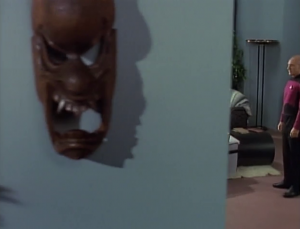 Picard comes to talk with the boy. Seriously look at this art on their wall. That would freak me out as a kid