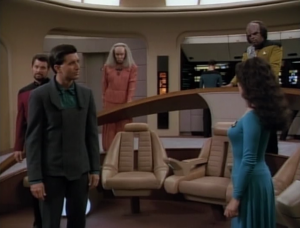In the end Troi calls him out, and then he buys a worthless wormhole