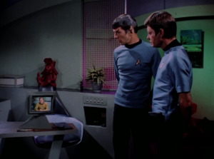 Bones and Spock start to fight, but then they watch a recording Kirk left them telling them to work together