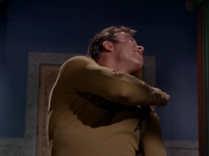 Kirk shows the leader some attitude and they make Kirk slap himself