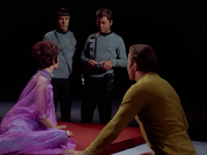 Spock, Bones and Kirk find themselves in a big dark room with a lady that can't speak