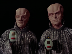 Then evil aliens show up with sparkly outfits