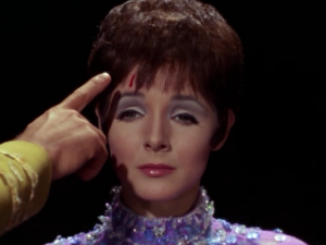 Gem can transfer wounds from other people to her, as Kirk is helpfully pointing out
