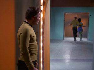 He locks up Kirk and changes to look like him. He wants to take control of Enterprise