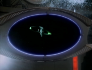 It was a cloaked Romulan Warbird! It's actually kind of lame that one Warbird could take out DS9