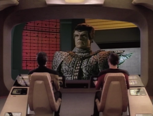 More Romulans show up. They seek the right of vengeance against the alien