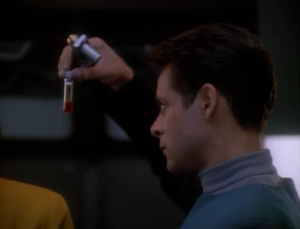 Dang, Bashir. Seems like a lot of blood for the test. Don't they just need to see if a drop separates and remains blood?