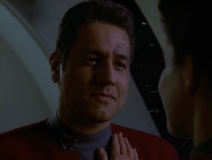 She touches his chest