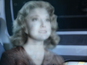 She makes it off the ship and starts to glow