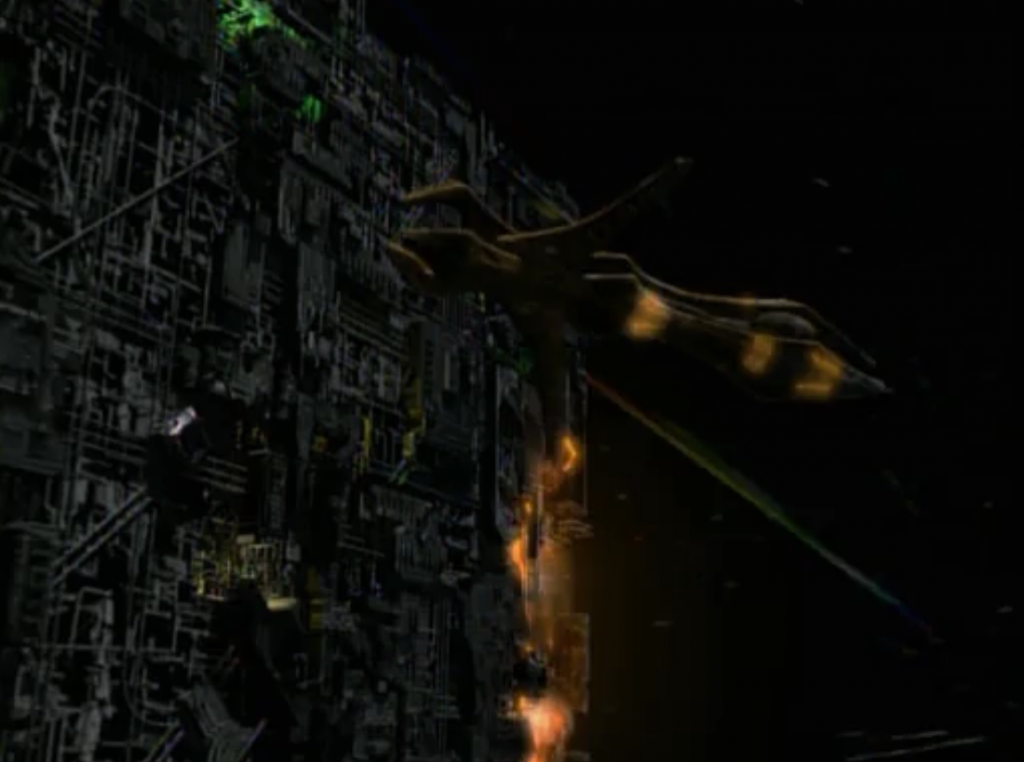 Species 8472 attacks. The Borg cube sacrifices itself to save Voyager