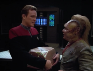 Neelix asks Tom for advice on dating
