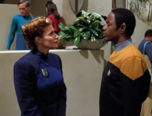 Tuvok chats with the lady in charge of security on the planet. Apparently they don't have any more crime