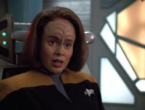 They charge B'Elanna with having a violent thought, because having a violent though makes these aliens uncontrollably attack people. You'd think they wouldn't even let outsiders on their planet
