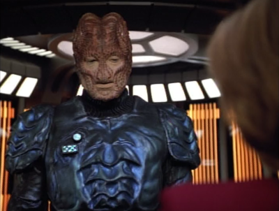 They help the Hirogen, and and then ask him for a hand in catching the 8472 guy