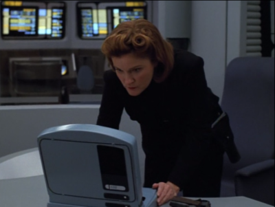 Janeway finds a way to disable the mind controlers