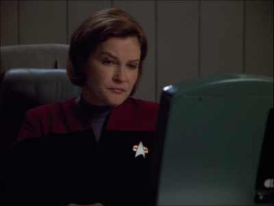 Janeway is being super secretive about something called the Omega Directive, which is apparently issued to all the top level Starfleet people