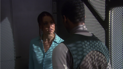 Travis's old girlfriend warns him that there's still a spy out there because seriously she's not a spy for Terra Prime